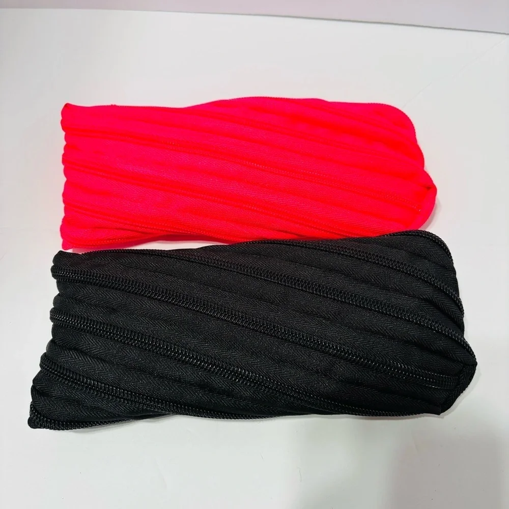 Red and Black Monster-Inspired Accessory Bags